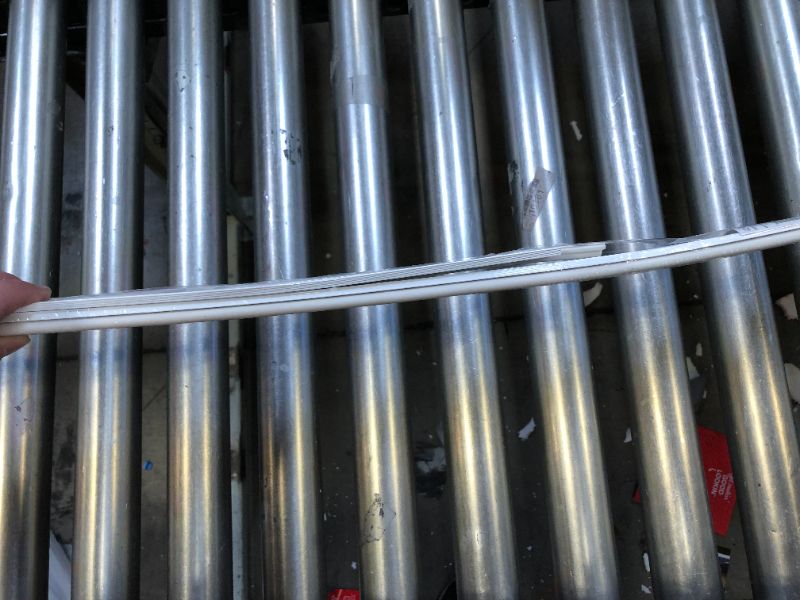 Photo 1 of Frost King Aluminum and Vinyl Adjustable Nail-On or Screw-On Door Sets, 3/4"x17' White, 2 pcs-7' & 1 pc-3 '
