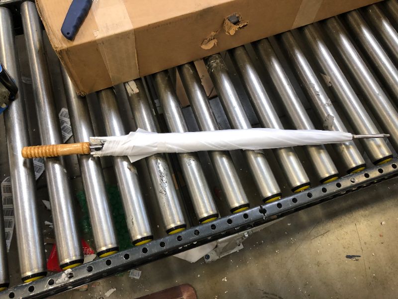 Photo 1 of Generic white umbrella 