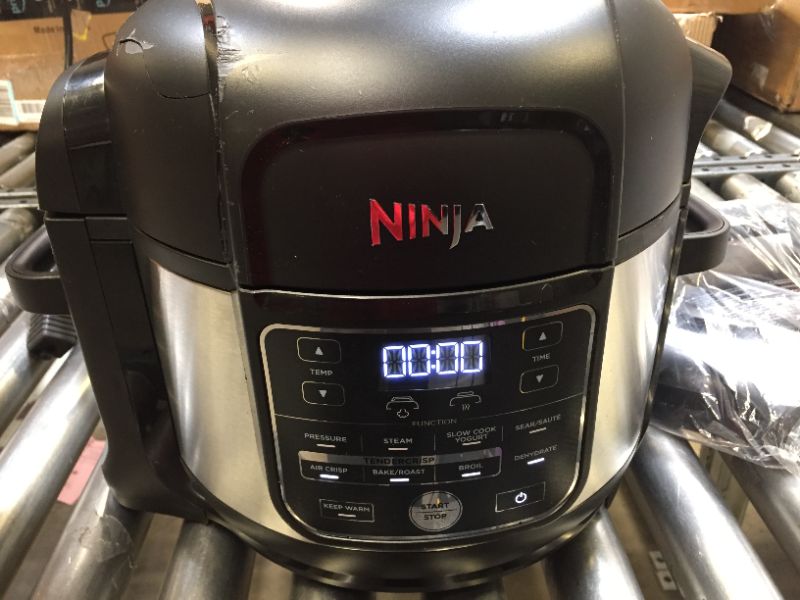 Photo 4 of Ninja FD302 Foodi 11-in-1 Pro 6.5 qt. Pressure Cooker & Air Fryer that Steams, Slow Cooks, Sears, Sautés, Dehydrates & More, with 4.6 qt. Crisper Plate, Nesting Broil Rack & Recipe Book, Silver/Black
