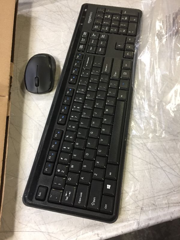 Photo 2 of AmazonBasics Wireless Computer Keyboard and Mouse Combo - Quiet and Compact - US Layout (QWERTY)