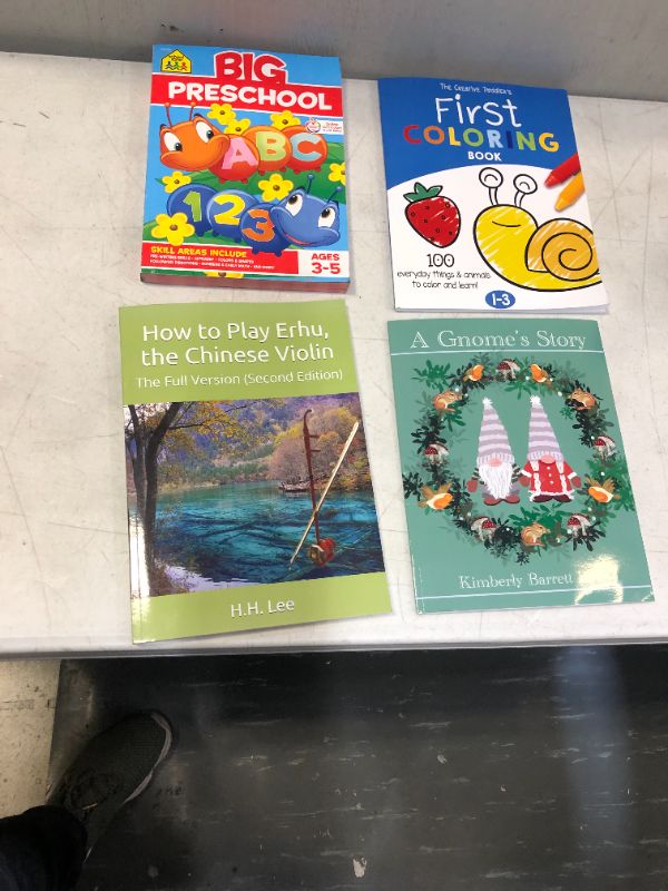 Photo 1 of 4 Pack of Books