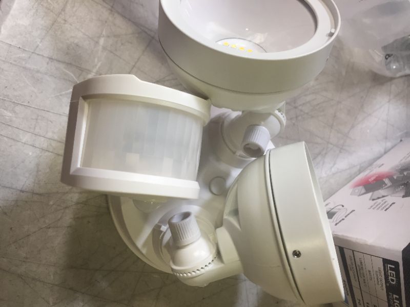 Photo 1 of Defiant 180° White Motion Activated Sensor Twin-Head Round Outdoor Integrated LED Security Flood Light
