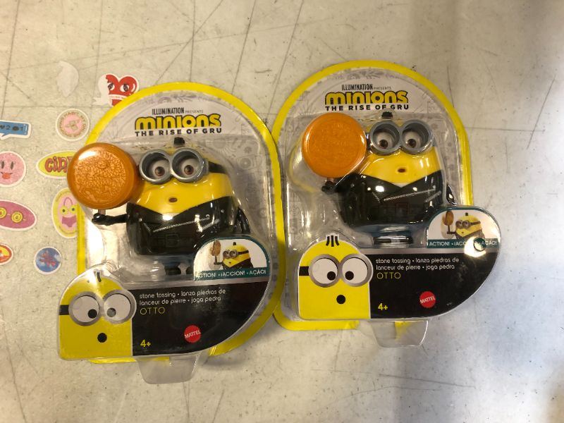 Photo 2 of Minions: Rise of Gru Otto Button Activated Action Figure Approx 4-in with Zodiac Stone Accessory, Gift for Kids Ages 4 Years & Older
