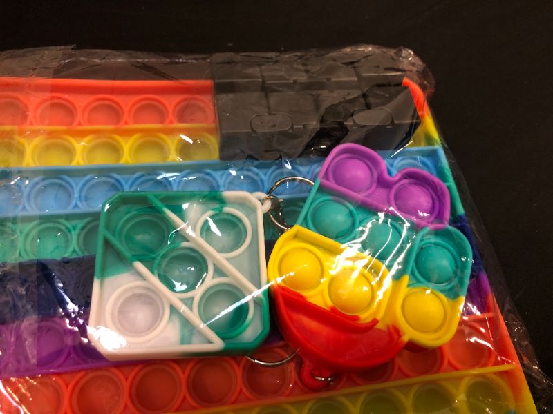 Photo 2 of big size fidget toys rainbow 4 pack 