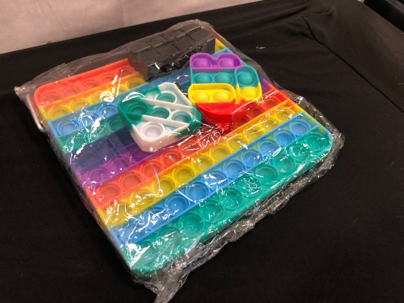 Photo 1 of big size fidget toys rainbow 4 pack 