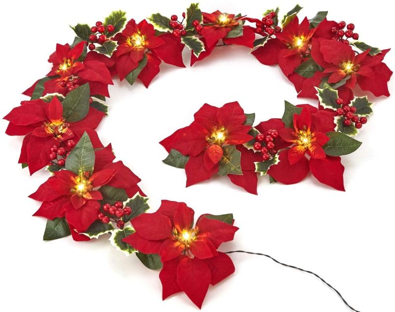 Photo 1 of ***battery not included***HOMESEASONS Pre-Lit Velvet Artificial Poinsettia 6 feet Garland with Red Berries and Holly Leaves - 3AA Battery Operated Indoor and Outdoor Use (1 Pack