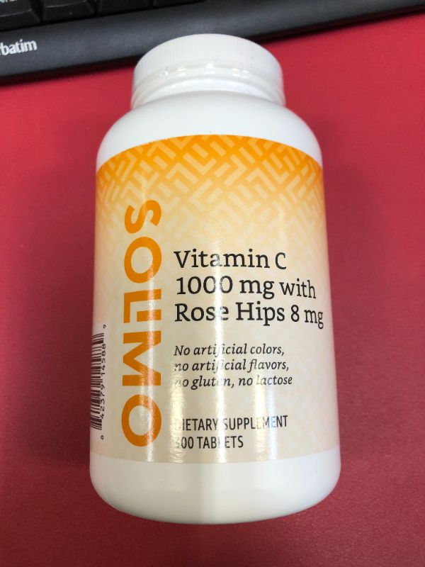 Photo 2 of Amazon Brand - Solimo Vitamin C 1000 mg with Rose Hips 8 mg, 300 Tablets, Ten Month Supply
exp 06/2022