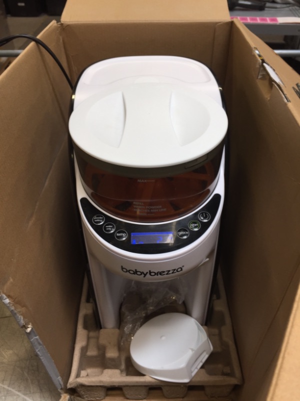 Photo 1 of New and Improved Baby Brezza Formula Pro Advanced Formula Dispenser Machine - Automatically Mix a Warm Formula Bottle Instantly - Easily Make Bottle with Automatic Powder Blending
