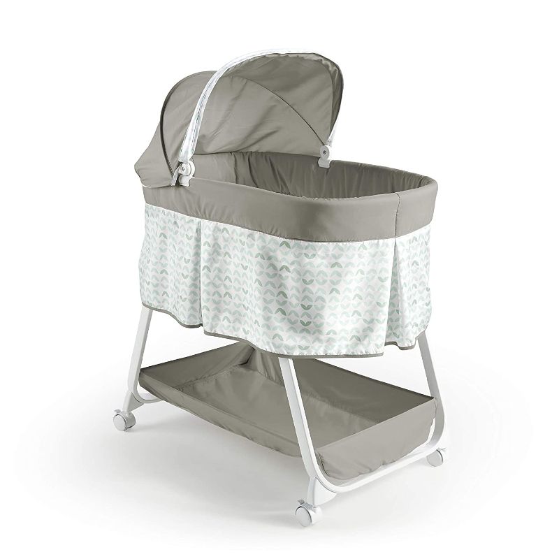 Photo 1 of Ingenuity Ity Snuggity Snug Bedside Baby Bassinet, Soothing Vibrations Portable Crib with Storage Basket, Nimbu, Grey
