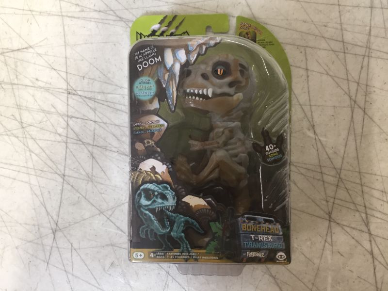 Photo 2 of WowWee Untamed Skeleton T-Rex by Fingerlings – Doom (Ash) – Interactive Collectible Dinosaur -- 2 PACK