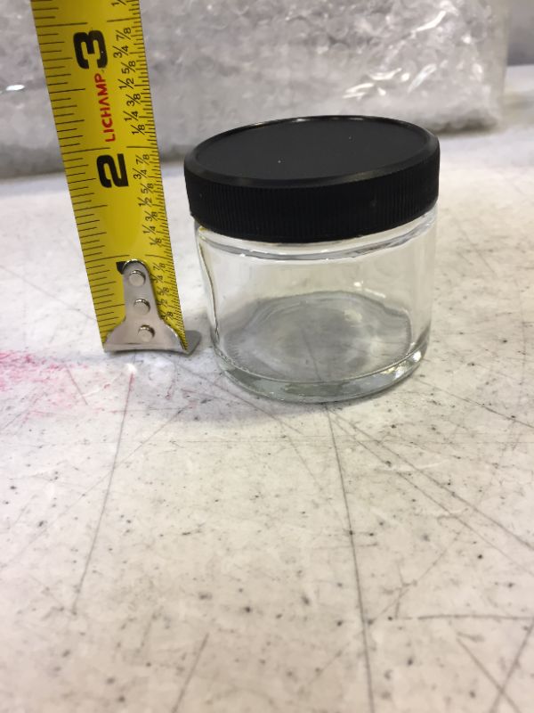 Photo 1 of 20 small glass jar with plastic black lid 