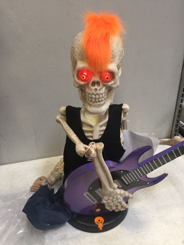 Photo 3 of 37inch Voice-Activated Skeleton Skull, Indoor/Outdoor Halloween Decoration,Sit on The Fireplace and Play The Guitar,Creepy Tabletop Decor