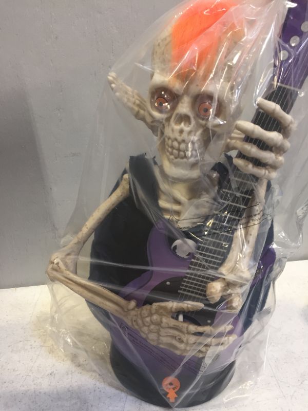 Photo 2 of 37inch Voice-Activated Skeleton Skull, Indoor/Outdoor Halloween Decoration,Sit on The Fireplace and Play The Guitar,Creepy Tabletop Decor