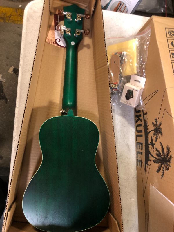 Photo 2 of Donner Concert Ukulele Professional 23 Inch Mahogany Ukelele for Kid Adult Beginner Ukele Bundle with Online Lesson Gig Bag Aquila String Pick Tuner Strap Cloth DUC-200G Green
