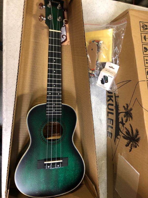 Photo 5 of Donner Concert Ukulele Professional 23 Inch Mahogany Ukelele for Kid Adult Beginner Ukele Bundle with Online Lesson Gig Bag Aquila String Pick Tuner Strap Cloth DUC-200G Green
