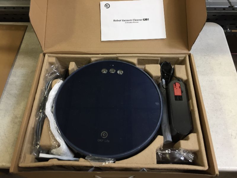 Photo 2 of OKP Robot Vacuum Cleaner, 2000Pa Super Suction, Two-Layer Dust Box Design, Self Charging, Quiet Cleaning for Pet Hair, Blue
