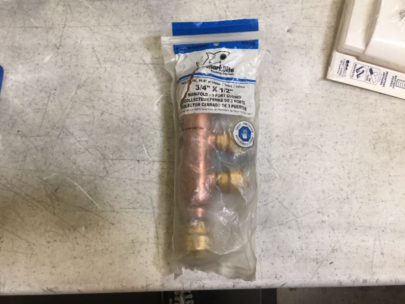 Photo 1 of 3/4 in. x 1/2 in. Push-to-Connect Copper 3-Port Closed Manifold Fitting
