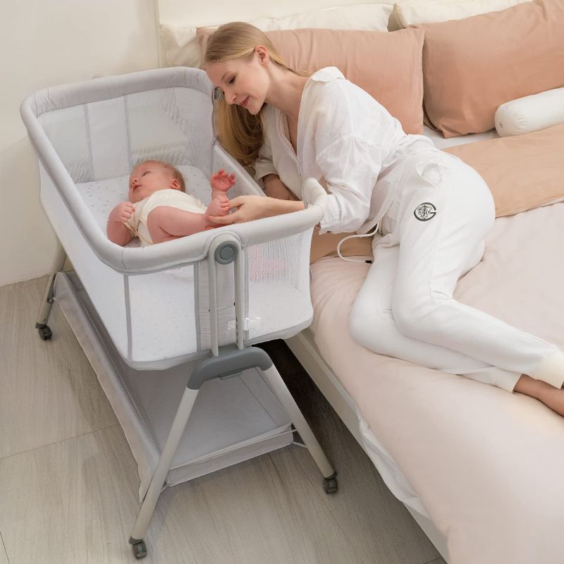 Photo 1 of ANGELBLISS Baby Bassinet Bedside Crib, Easy Folding Bed Side Sleeper with Wheels Adjustable Height Portable Bassinet for Newborn Babies Infants, Included Breathable Mesh, Cozy Mattress (Off-White)
