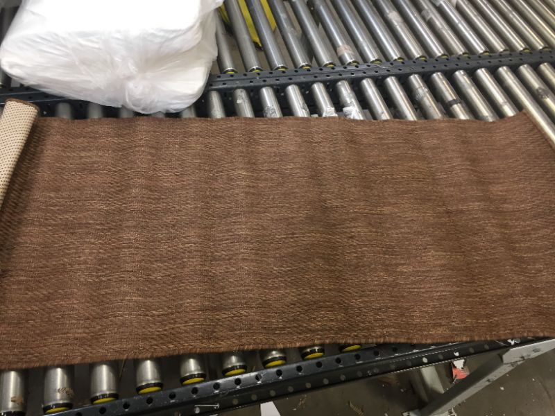 Photo 1 of 2'X5' brown rug 