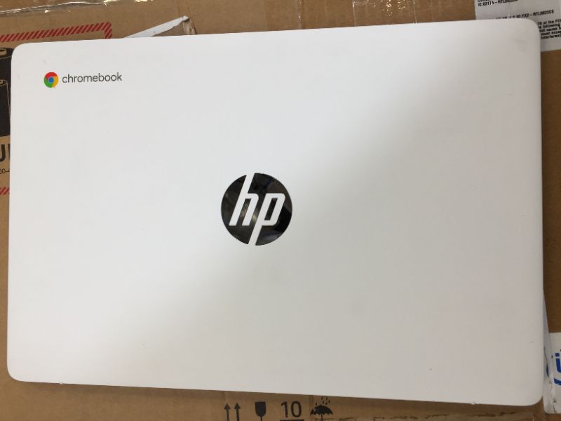 Photo 2 of HP Chromebook 14-inch HD Laptop, Intel Celeron N4000, 4 GB RAM, 32 GB eMMC, Chrome (14a-na0020nr, Ceramic White)