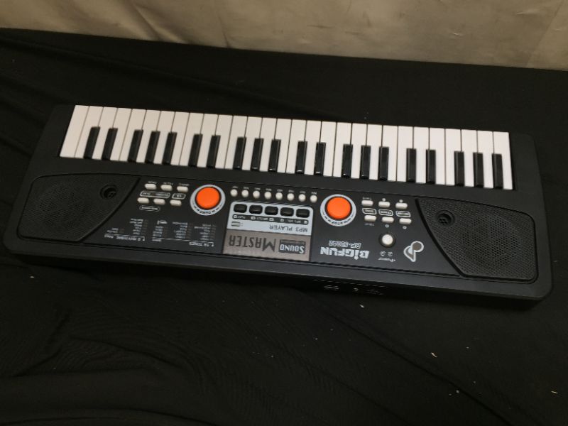 Photo 1 of TOY Keyboard (missing charger, battery)