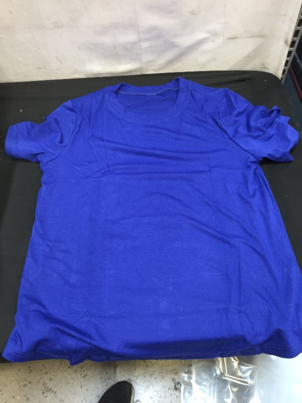 Photo 1 of ROYAL BLUE SHORT SLEEVE TOP SIZE MEDIUM