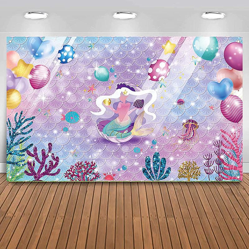 Photo 1 of JunyRuny Mermaid Backdrop Little Mermaid Party Decorations Mermaid Birthday Party Supplies Under The Sea Party Photography Background Banner Purple Pink Scales Princess Party Decorations 71 x 43 Inch
