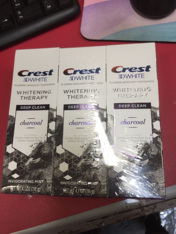 Photo 2 of Crest Charcoal 3D White Toothpaste, Whitening Therapy Deep Clean with Fluoride, Invigorating Mint, 4.1 Ounce, Pack of 3