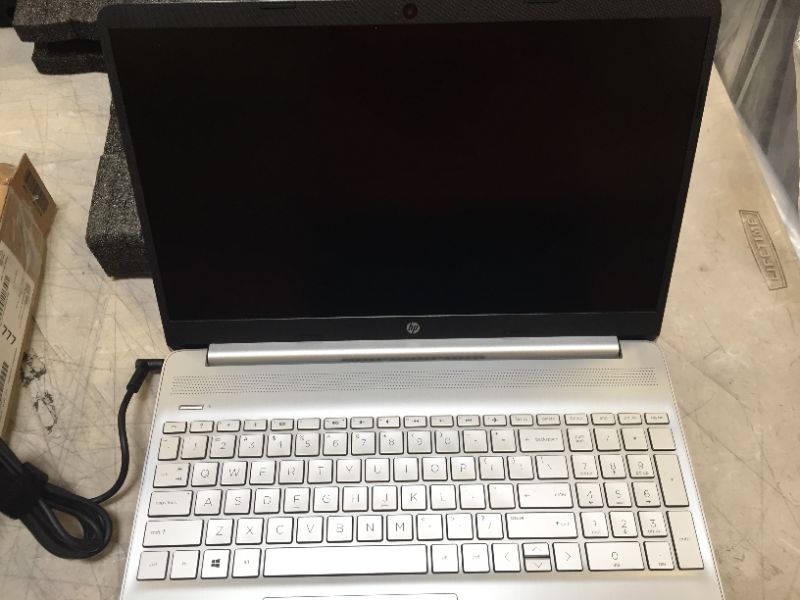 Photo 5 of HP 15-dy1036nr 10th Gen Intel Core i5-1035G1, 15.6-Inch FHD Laptop, Natural Silver--used and screen does not turn on 
