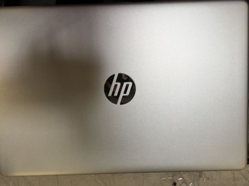 Photo 3 of HP 15-dy1036nr 10th Gen Intel Core i5-1035G1, 15.6-Inch FHD Laptop, Natural Silver--used and screen does not turn on 
