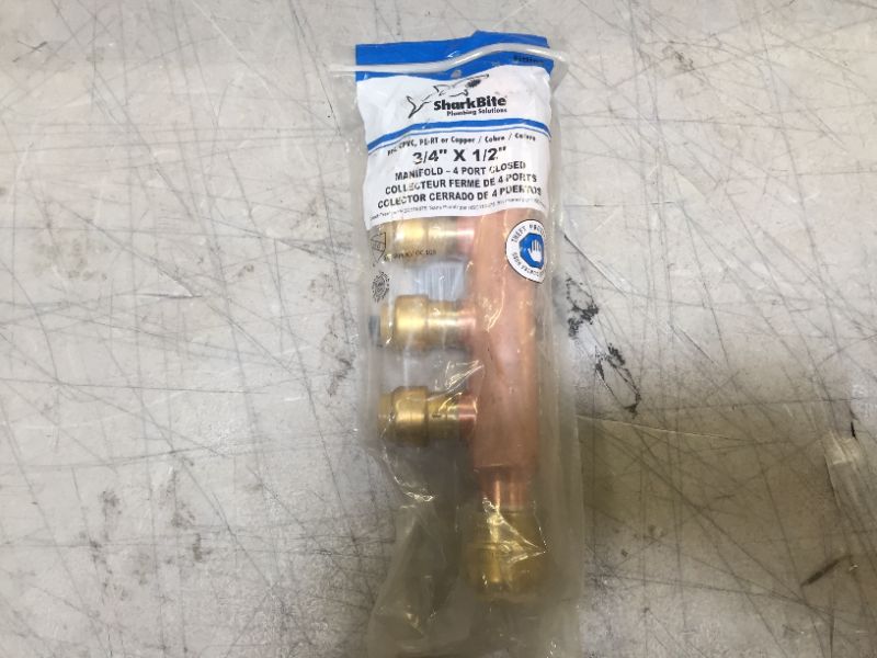 Photo 1 of 3/4 in. x 1/2 in. Push-to-Connect Copper 4-Port Closed Manifold Fitting
