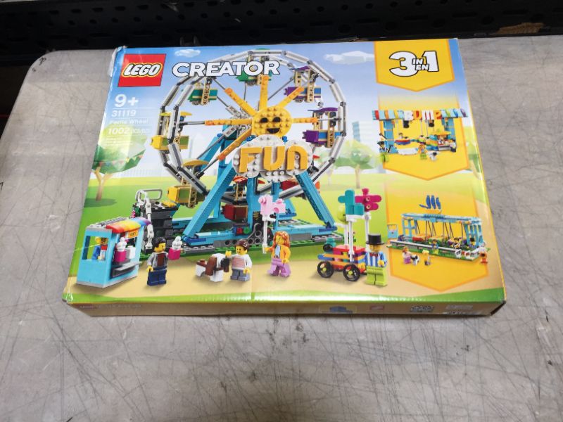 Photo 3 of LEGO Creator 3in1 Ferris Wheel 31119 Building Kit with Rebuildable Toy Bumper Cars, Boat Swing and 5 Minifigures (1,002 Pieces)