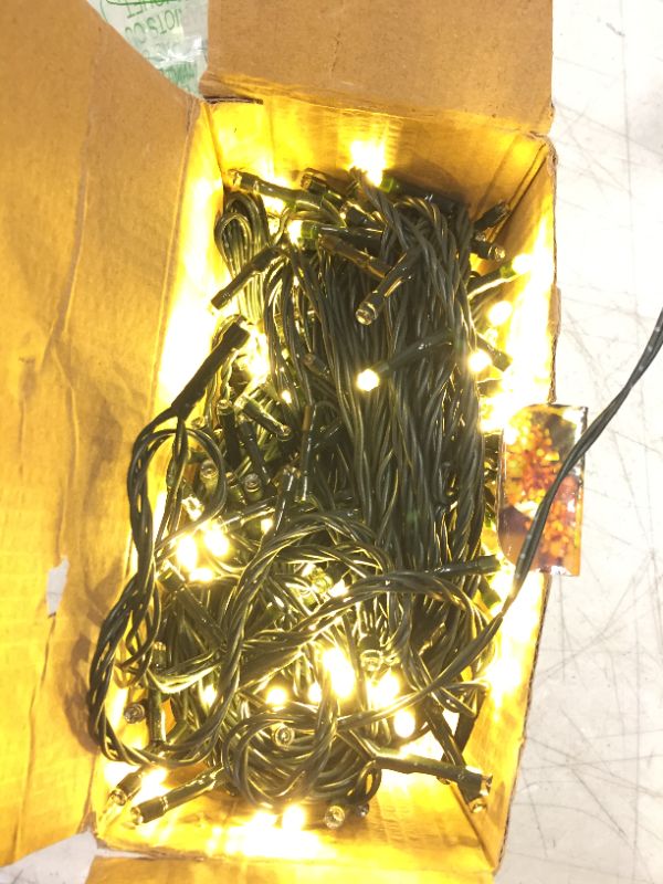 Photo 2 of 66ft Christmas String Lights, 200 Led Twinkle Fairy Lights String with 8 Modes, Plug in Connectable Fairy String Lights Green Wire, Christmas Decorations for Xmas Tree Party Yard Garden(Warm White)
