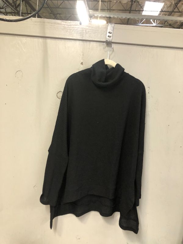 Photo 1 of Black women's turtleneck sweater 