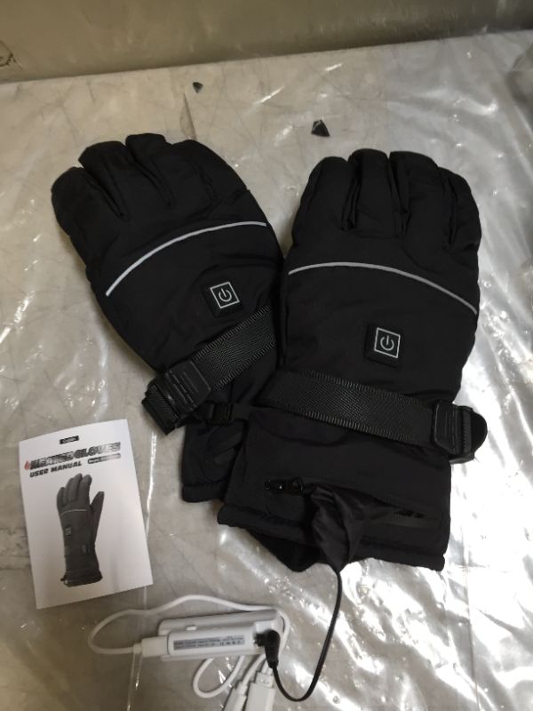 Photo 1 of heated gloves
 size M