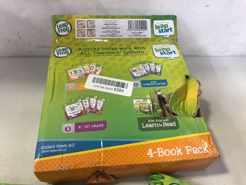 Photo 3 of LeapFrog LeapStart Preschool 4-in-1 Activity Book Bundle with ABC, Shapes & Colors, Math, Animals
(MAJOR DAMAGES TO BOX FROM EXCOSURE)