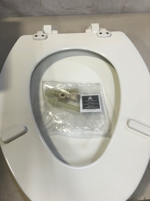 Photo 4 of BEMIS Jamestown Adjustable Slow Close Never Loosens Elongated Closed Front Toilet Seat in White
