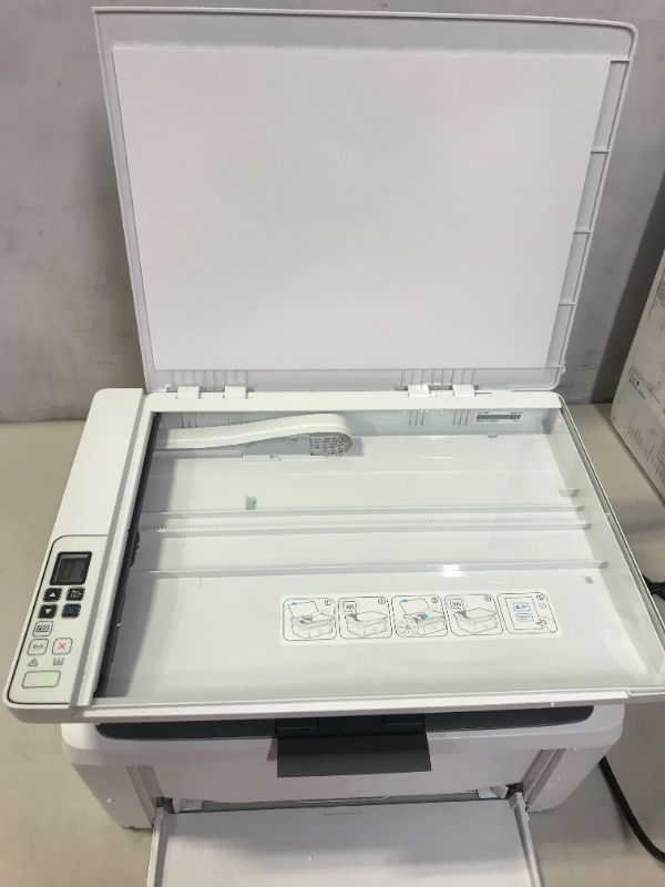 Photo 1 of HP LASER JET PRO MFP M29W (PET HAIR ON ITEM, MISSING MANUAL)