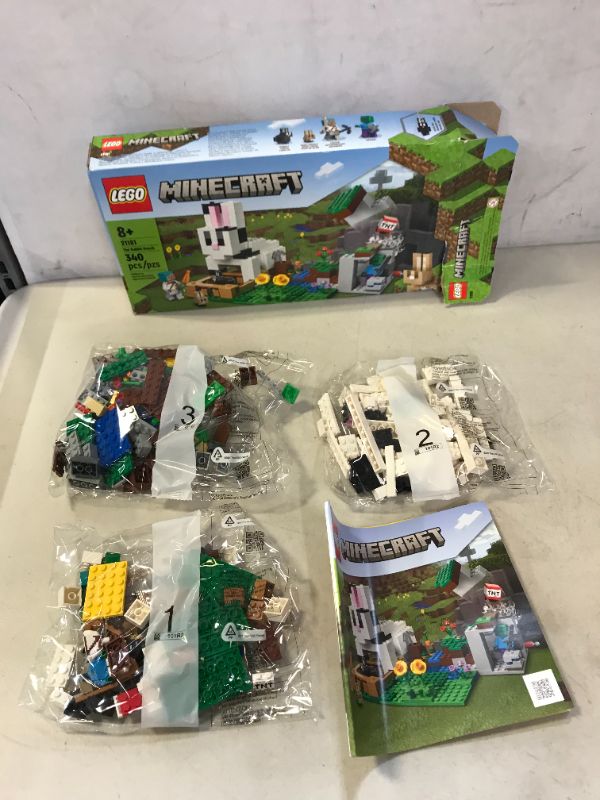 Photo 1 of LEGO Minecraft The Rabbit Ranch 21181 Building Kit; Toy Bunny House Playset; Gift for Kids and Players Aged 8+ (340 Pieces) MAJOR DAMAGE TO PACKAGING
