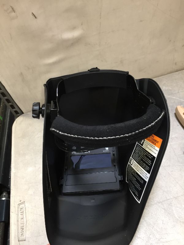 Photo 3 of Lincoln Electric Lincoln Electric Welding Helmet Kit: Auto-Darkening, Black, W9 to W13, 3.82 in x 1.73 in, Analog 9helmet is a bit bent)