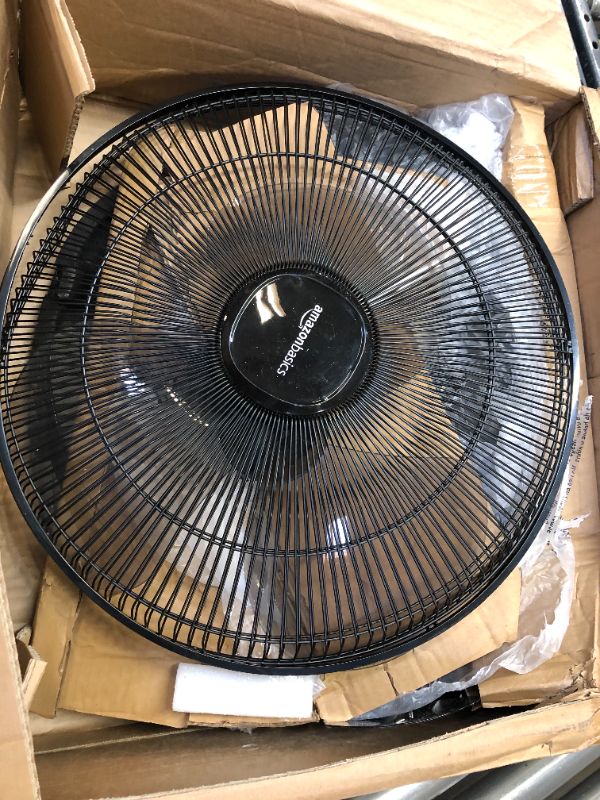 Photo 1 of Amazon Basics Oscillating Dual Blade Standing Pedestal Fan with Remote - 16-Inch