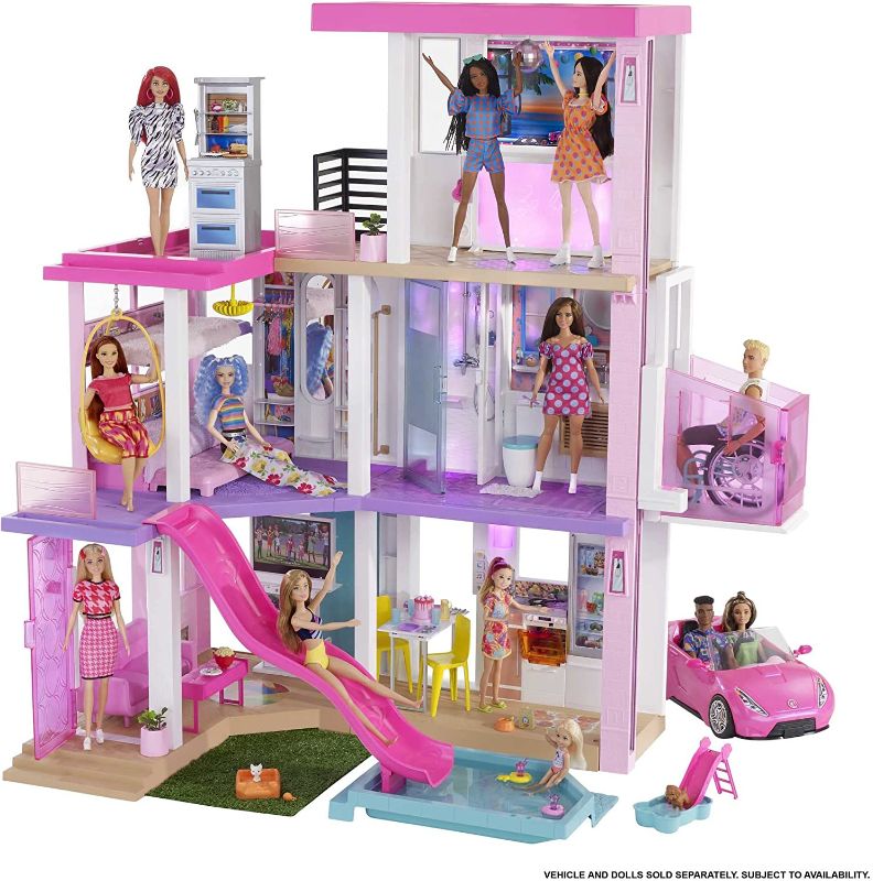 Photo 1 of Barbie Dreamhouse (3.75-ft) 3-Story Dollhouse Playset with Pool & Slide, Party Room, Elevator, Puppy Play Area, Customizable Lights & Sounds, 75+ Pieces, Gift for 3 to 7 Year Olds, New for 2021
