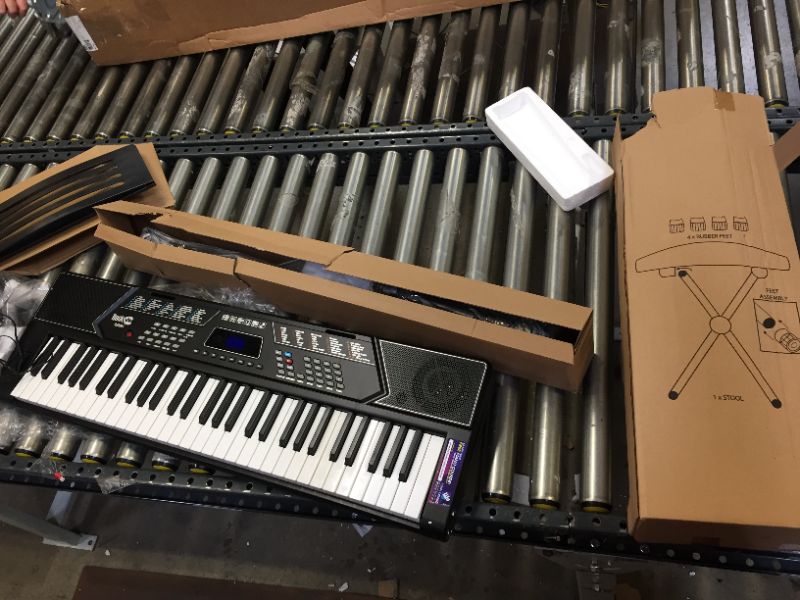 Photo 1 of RockJam 61 Key Keyboard Piano With Pitch Bend Kit, Keyboard Stand, Piano Bench, Headphones, Simply Piano App & Keynote Stickers
