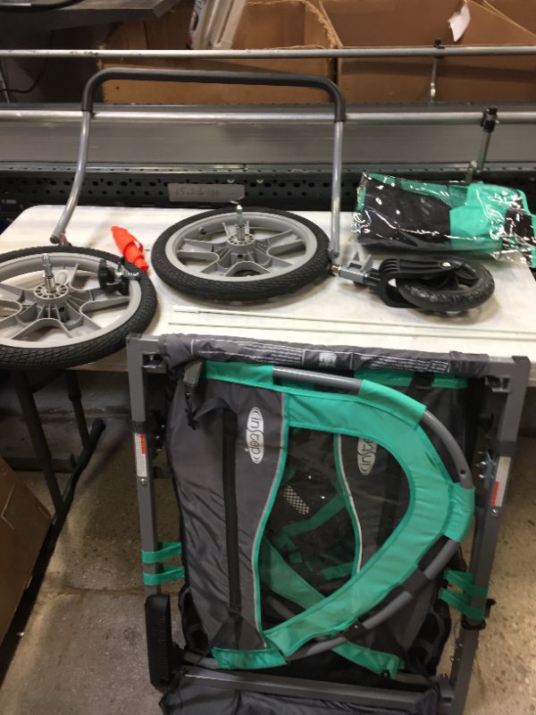 Photo 1 of Instep Quick-N-EZ Double Tow Behind Bike Trailer for Toddlers, Kids, Converts to Stroller, Jogger, 2-in-1 Canopy, Universal Bicycle Coupler, Folding Frame, Multiple Colors
