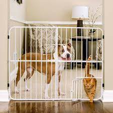 Photo 1 of Big Tuffy expandable pet gate with small pet door