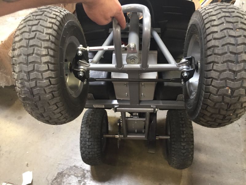 Photo 5 of Razor Dirt Quad - 24V Electric 4-Wheeler ATV - Twist-Grip Variable-Speed Acceleration Control, Hand-Operated Disc Brake, 12" Knobby Air-Filled Tires
