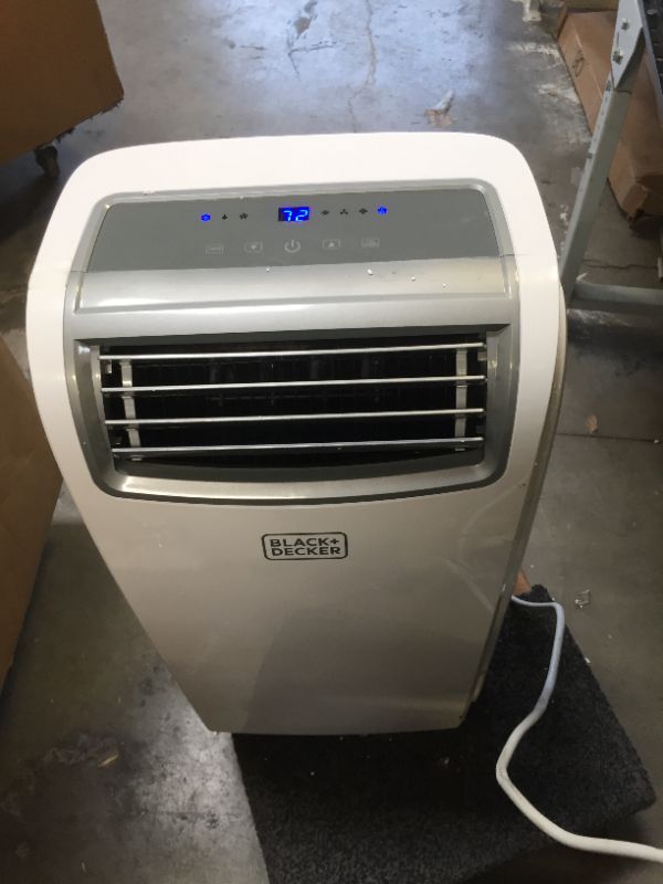 Photo 1 of BLACK+DECKER 5,950 BTU DOE (12,000 BTU ASHRAE) Portable Air Conditioner with Remote Control, White
