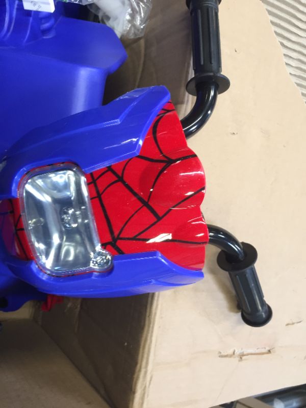 Photo 3 of Kid Trax Toddler Marvel Spider-Man Electric Motorcycle Ride On Toy, Kids 1.5-3 Years Old, 6 Volt Battery and Charger Included, Max Weight 45 lbs, Spider-Man Motorcycle
