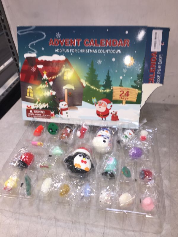 Photo 2 of 2021 Advent Calendar Kids Christmas Countdown Calendar 24 Days Mochi Squishy Toys Pull Back Cars Wind Up Toys Christmas Erasers Christmas Party Favors for Girls Boys