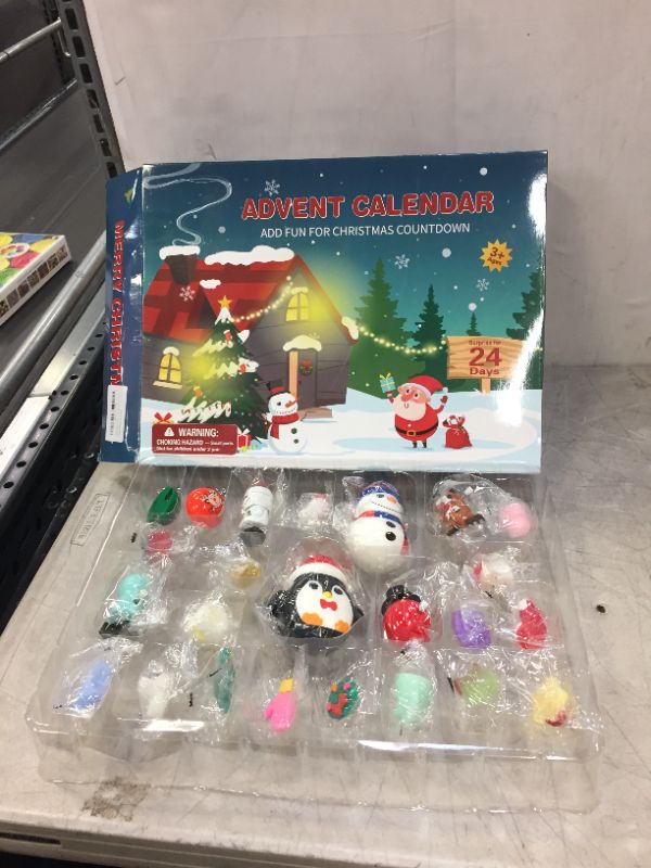 Photo 2 of 2021 Advent Calendar Kids Christmas Countdown Calendar 24 Days Mochi Squichy Toys Pull Back Cars Wind Up Toys Christmas Erasers Christmas Party Favors for Girls Boys